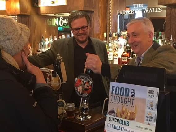 Sir Lindsay pulls pints at historic Chorley pubs