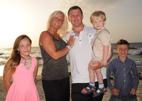 Joanne and Paul with their family