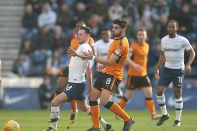 Alan Browne shields the ball from Ruben Neves