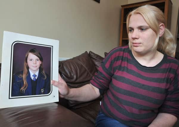 Tara Palin, with picture of her daughter who was sent away to Middlesbrough