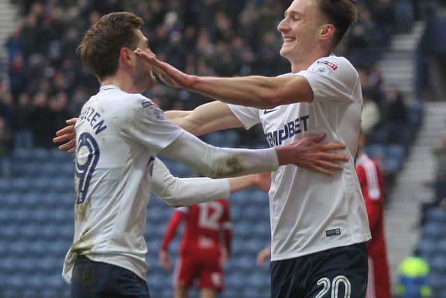 Ben Davies (right) is congratulated by Tom Barkhuizen after scoring against Birmingham last month