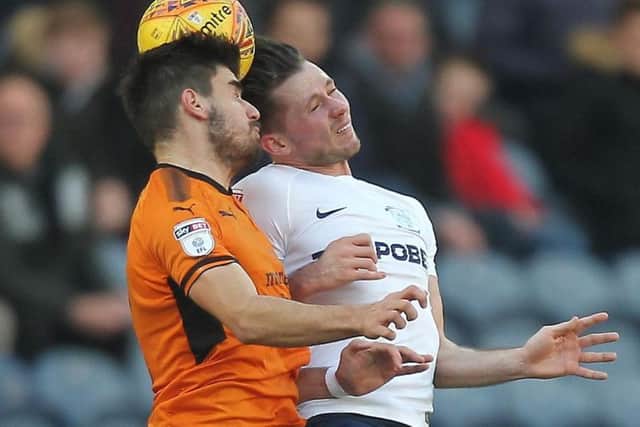 Alan Browne battles with Wolves' Ruben Neves in the 1-1 draw at Deepdale