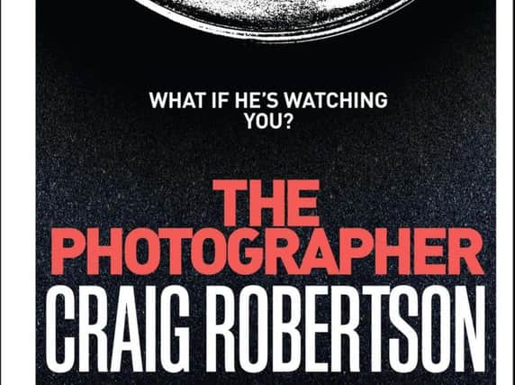 The Photographer by Craig Robertson