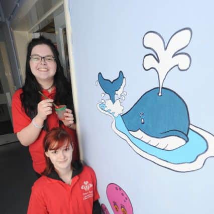Prince's Trust Preston Central Team 66 have painted and decorated the walls at Stoneygate Nursery School.  Pictured are Rebecca Simpson and Shannon Rishton.