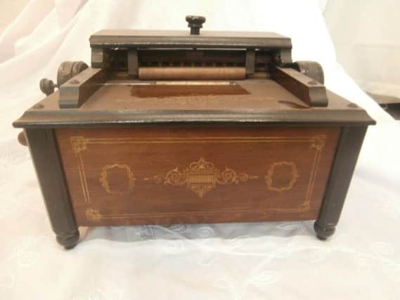 This music box is actually a rare miniature organ by J.N.Draper