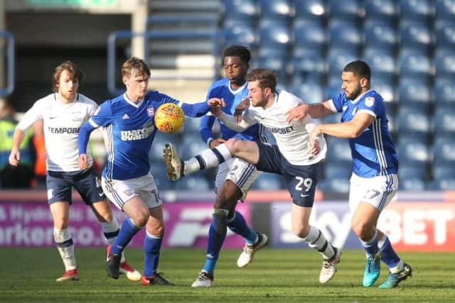 Tom Barkhuizen attempts to make inroads into the Ipswich defence
