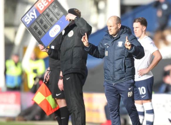 Preston North End's Manager Alex Neil makes a double substitution