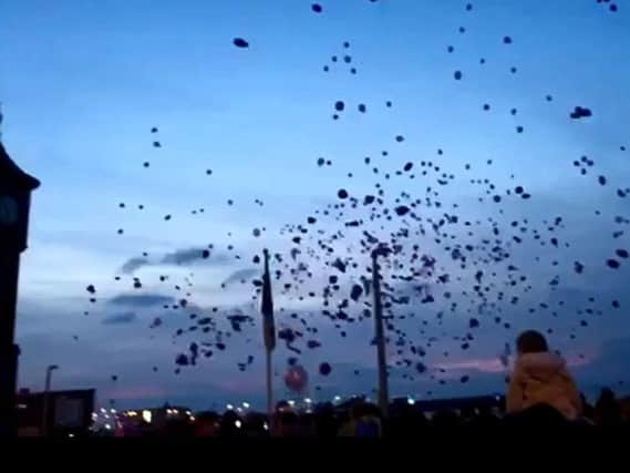 The balloon release in memory of Sian Waterhouse. Photo from video by Kaitlin Maskrey.