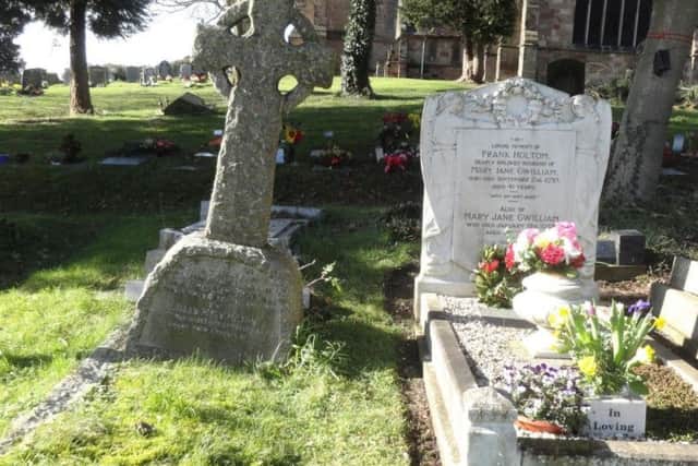 The grave of Colonel James Milton, left, which is in danger of tipping over