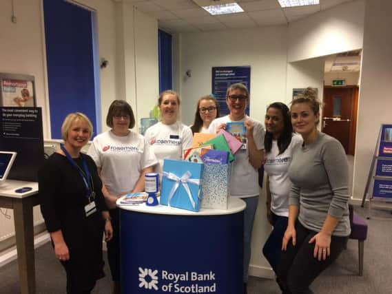 Rosemeres Cathy Skidmore (far left) and central area fundraising co-ordinator Rebecca Hall (far right), who are with, from the left, Tracey Jackson, Fiona Gee, Fallon Cottam-Howarth, Donna Finn and Bav Modessa - all from Royal Bank of Scotland