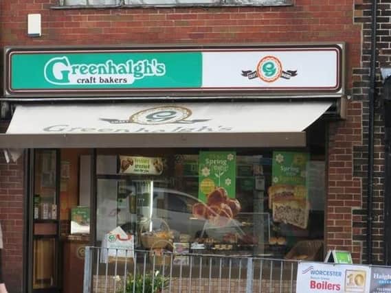 A man threatened a member of staff with a crowbar during a robbery at an Adlington bakery, say police.