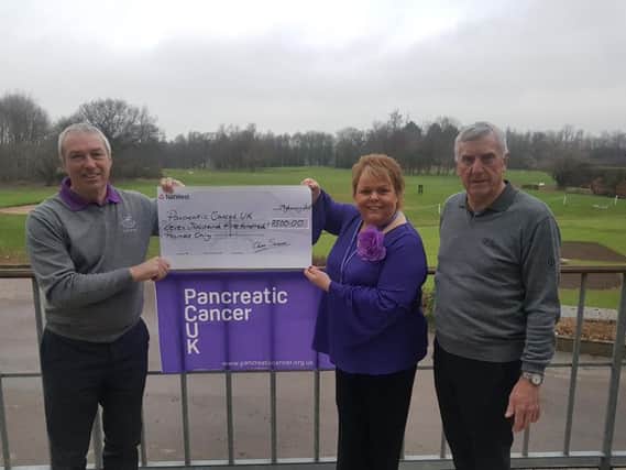 Preston Golf Club captain Chris Sumner, Pancreatic Cancer UK representative Lynn Quigley and club member Keith Hutton, who lost his wife Pat to the disease.