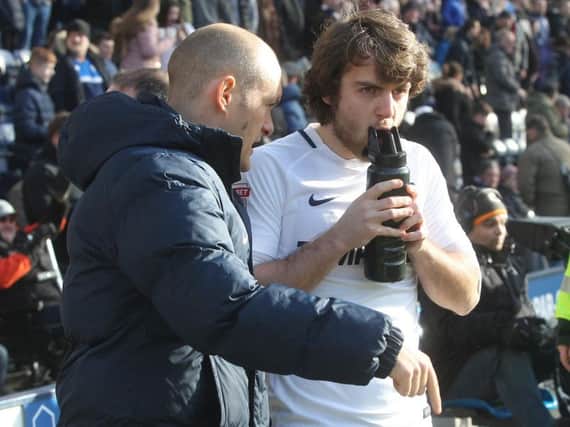 Alex Neil dishes out instructions to Ben Pearson.