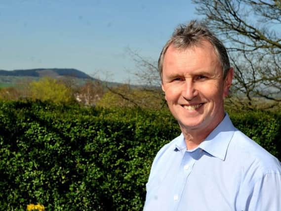 Nigel Evans MP has called for more to be done to rid Lancashire of its pothole problem.