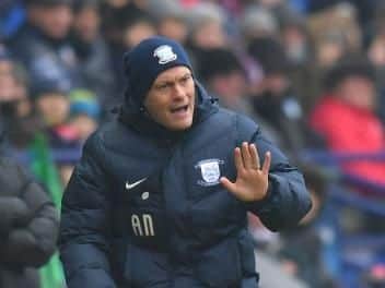 Alex Neil hands out instructions at Bolton.