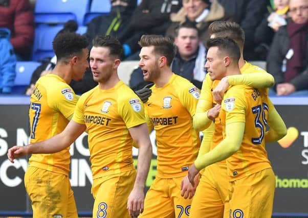 Tom Barkhuizen is congratulated after scoring Preston's equaliser against Bolton