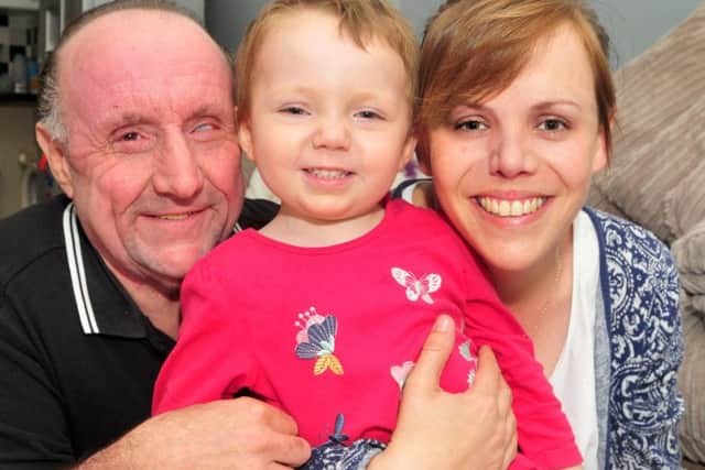 Jorgie Rae Griffiths with her parents Barry Griffiths and Lauren McCabe