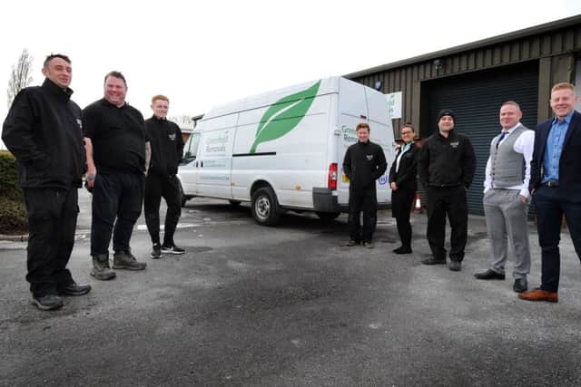 Staff at asbestos removal firm Greenfield Removals in Chorley