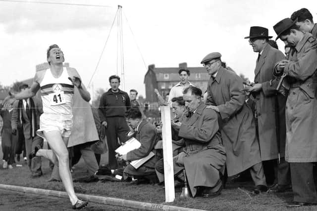 Roger Bannister breaks the four-minute mile barrier in 1954 in Oxford  his time was recorded as 3:59.4