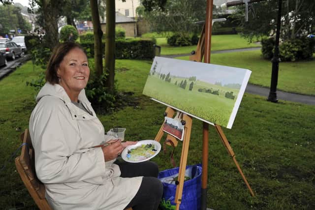 Kathleen Ashall from Longridge paints a poppy field in Townley Gardens at the 'Create Longridge' art festival last year.