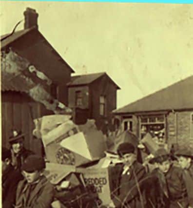 Rev Ron March 13 Garstang cubs and scouts in 1940 did their bit for the war effort in collecting salvage, old Kodak box camera with the caption on it, 13th Preston St. Thomas Scout Whit camp to Wray Castle in the Lakes, true to life picture of Windy Street, people responding in 1941 to a WVS scrap metal for aircraft and general salvage campaign. 'L'plate