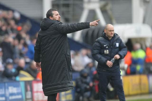 Slavisa Jokanovic and Alex Neil on the touchline at Deepdale