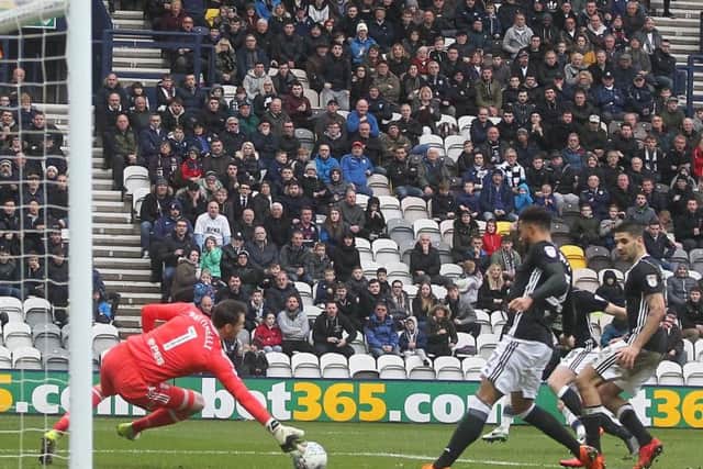 Fulham keeper Marcus Bettinelli saves Ben Davies' shot