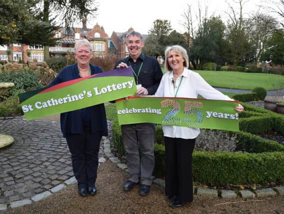 The St Catherine's Hospice lottery team is celebrating the scheme's 25th anniversar