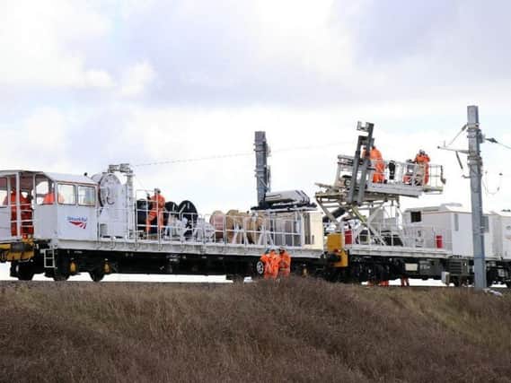 Overhead wiring train at Preese Hall