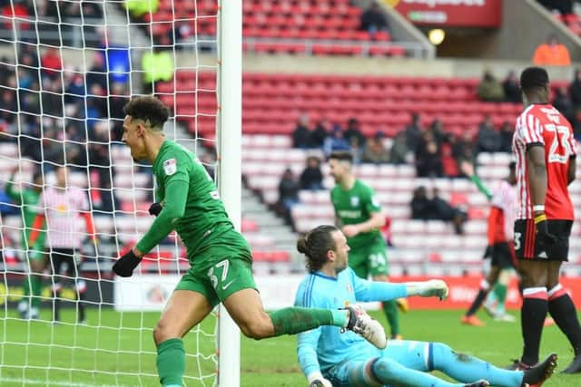 Callum Robinson celebrates scoring PNE's second goal