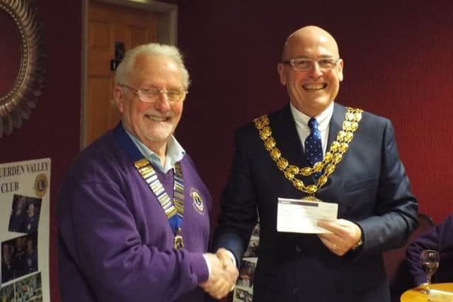 Leyland and Cuerden Valley Lions charity presentation evening: SRBC Mayor Mick Titherington receives a cheque for the Mayor's Charity Fund.