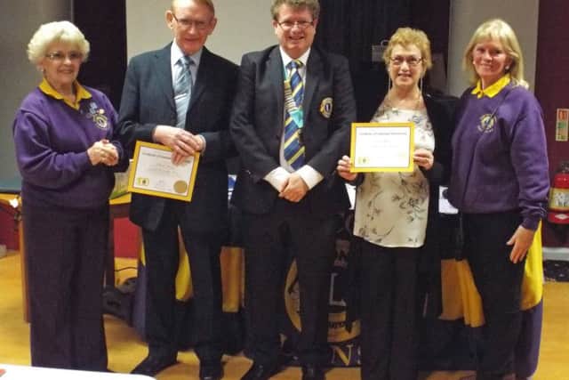 District Governor Elect, Lion John Crompton (centre) inducted two new members into Leyland & Cuerden Valley Lions, Edward and Myrna Deeney, seen here with their sponsoring Lions, Dorothy Livesey and Josie Jump.