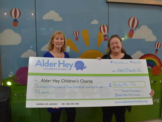 Shaw Hills Lady Captain for 2017, Alison Davidson, hands over a cheque to Alder Hey Childrens Hospital for 16,405