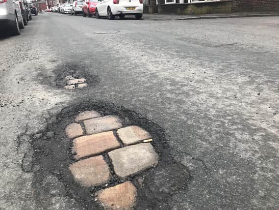 Cobbles were discovered under the pothole