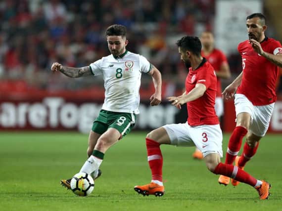 Sean Maguire takes on Turkey's Hasan Ali Kaldirim