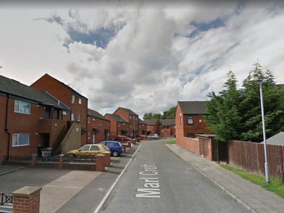 The 17-year-old was sat with two friends on Marl Croft Crescent at around 8.30pm on Monday