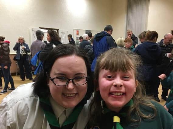 Group Scout leader Norma Bruce with Felicity Lowthian