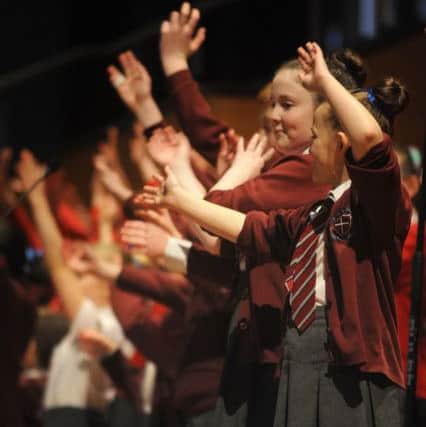 Primary schools from across the South Ribble area held a friendship song and dance show at Preston Guild Hall.
Over a thousand pupils join together on stage for the finale.  PIC BY ROB LOCK
28-2-2018