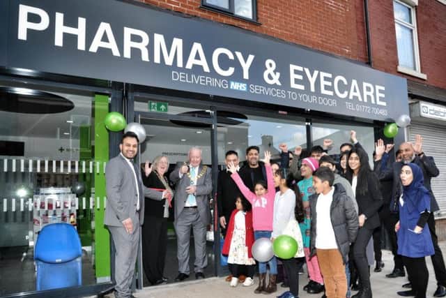 Mayor Brian Rollo reopening the NHL Pharmacy with resident doctor Sajeel Abrar (left). Photos by Julian Brown.