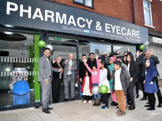 Mayor Brian Rollo reopening the NHL Pharmacy with resident doctor Sajeel Abrar (left). Photos by Julian Brown.