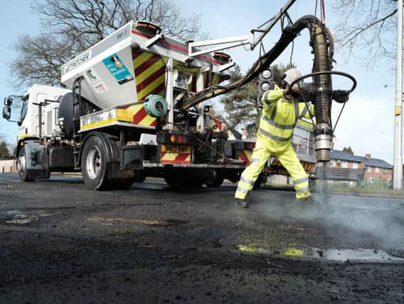 Lancashire County Council is bringing spray injection patching to the county to tackle the pothole epidemic. Pictured is Nigel Baines from Nuphalt Contracting. Photos: Denis Oates.