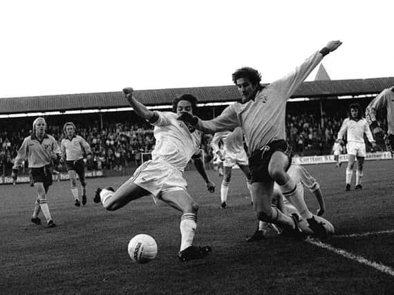 PNE midfielder Gordon Coleman attempts to put in a cross against Port Vale in August 1977
