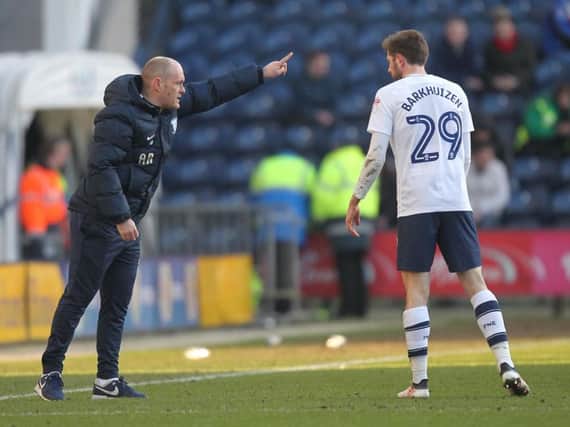 Alex Neil hands out instructions to Tom Barkhuizen.