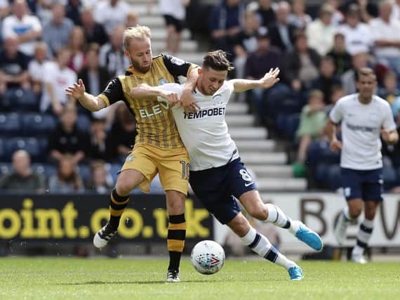 Alan Browne and Barry Bannan in the thick of the action in the opening day meeting between the sides.