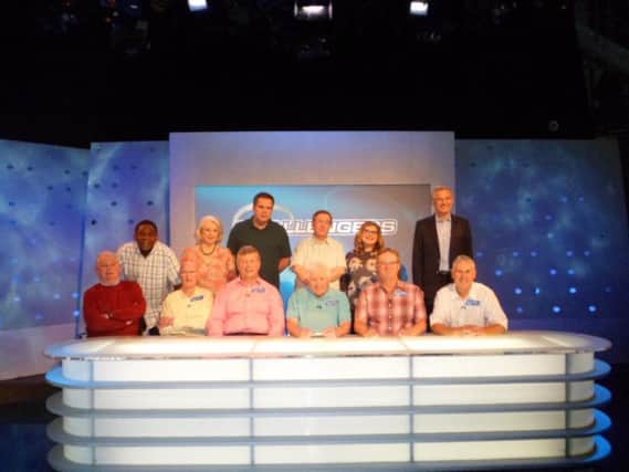 The Penwortham team on the front row with the Eggheads and presenter Jeremy Vine standing in the second row