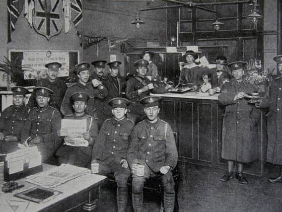 Soldiers enjoying tea and buns on Preston railway station