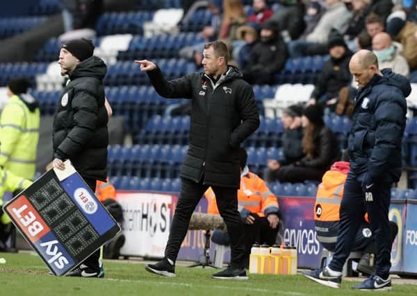 Derby County manager Gary Rowett shouts instructions to his team at Deepdale.