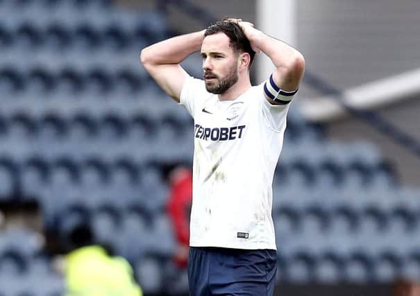 Preston North End's Greg Cunningham dejected at the final whistle