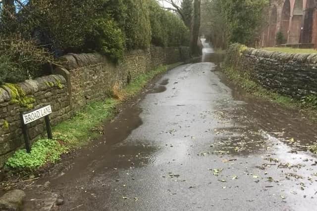 Broad Lane was flooded following heavy rain PIC: Peter Duckworth