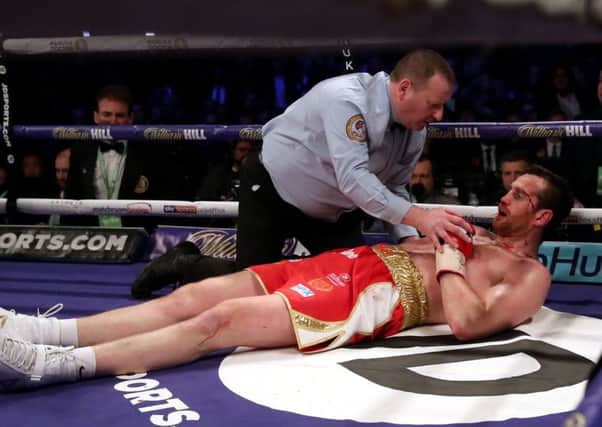 David Price on the canvas after being knocked down by Alexander Povetkin